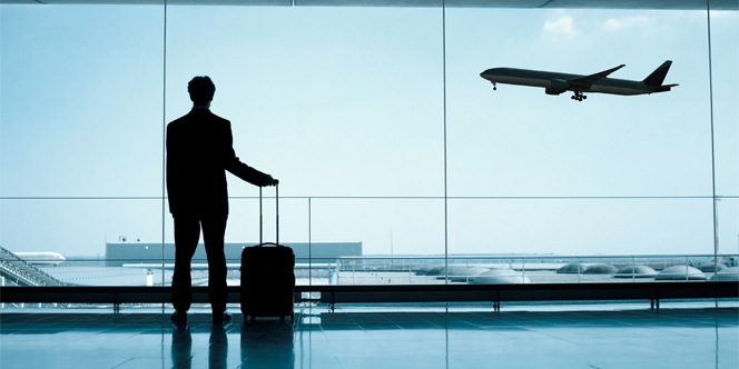 Business Class vs First Class: Which is Right for You? 7 business class vs first class businessman at the airport