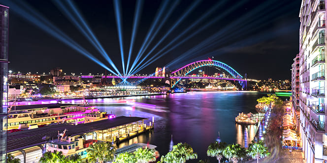 Where to Travel in May? Top 10 Destinations Worth Traveling (And Events to Attend) 10 Circular Quay and Sydney Harbour Bridge illuminated with colorful light during the Vivid Sydney 2017 Where to Travel in May? Top 10 Destinations Worth Traveling (And Events to Attend)