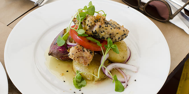 Where to Travel in May? Top 10 Destinations Worth Traveling (And Events to Attend) 9 Tuna Dish served on a plate in a seafood restaurant in Lisbon Portugal Where to Travel in May? Top 10 Destinations Worth Traveling (And Events to Attend)