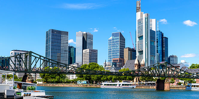 Germany Cultural Tour: Top Attractions & Things to Do in Germany 5 Beautiful view on Frankfurt am Main skyline cityscape with blue sky clouds Main river bridge Eiserner Steg in spring. Hessen Hesse Germany Germany Cultural Tour: Top Attractions & Things to Do in Germany
