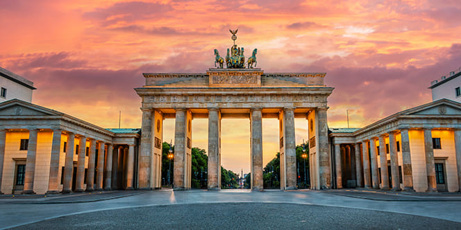 Germany Cultural Tour: Top Attractions & Things to Do in Germany 2 Brandenburg gate illuminated at sunset in Berlin Germany Germany Cultural Tour: Top Attractions & Things to Do in Germany