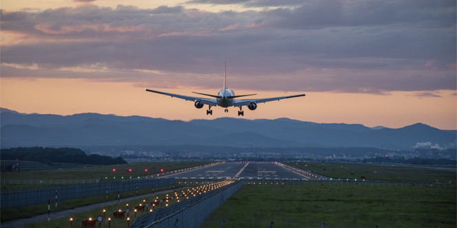 Business vs First Class for Senior Travelers: Luxury or Practical Comfort? 4 Business vs First Class for Senior Travelers - aircraft landing