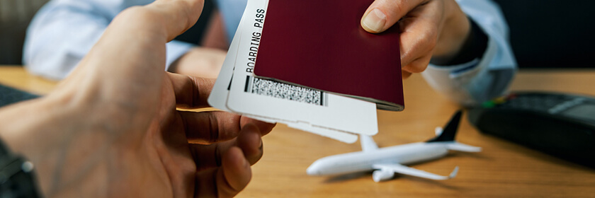 6 Travel Habits for a Better 2026 5 passport and boarding pass travel check in 6 Travel Habits for a Better 2026