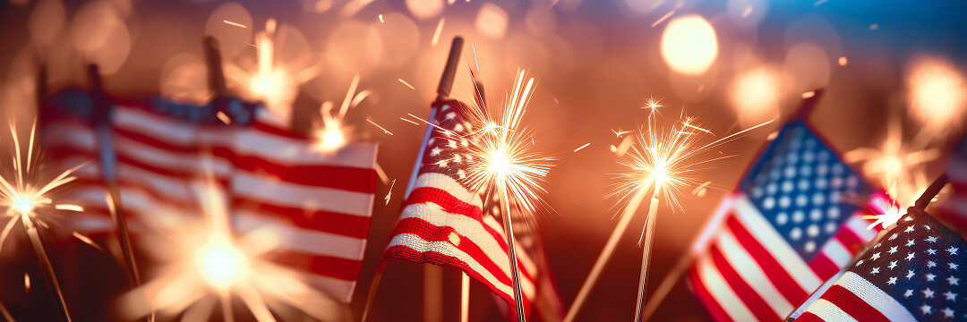 When to Book Flights for Holidays in 2026 3 usa holiday celebration american flags sparklers When to Book Flights for Holidays in 2026