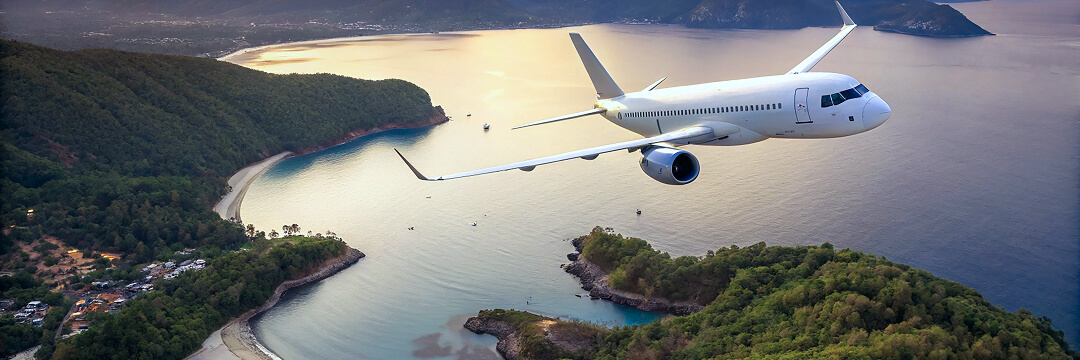 When to book flights for July–September 2026, before options become limited 5 aerial island coastline airplane flight ocean scenic travel destination