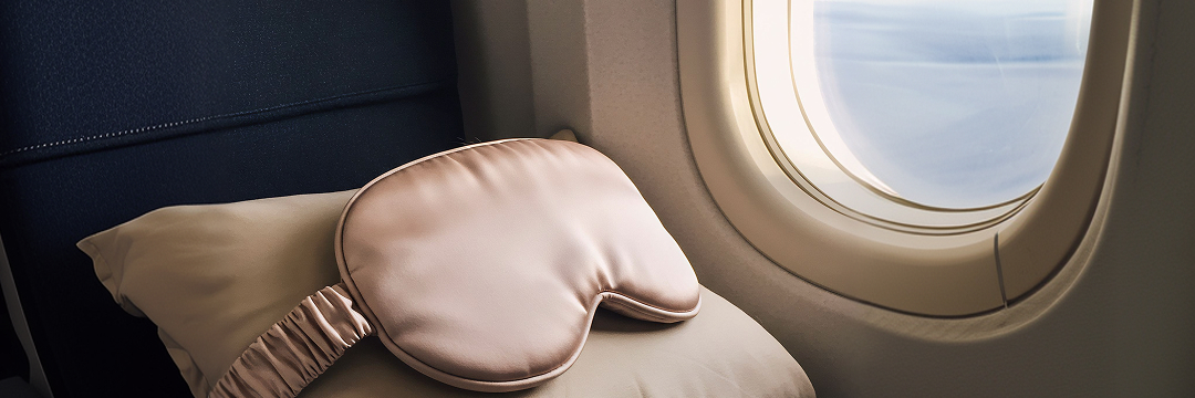 Best Luxury Travel Accessories for Him and Her in 2026 4 in flight comfort accessories pillow skincare arangrant