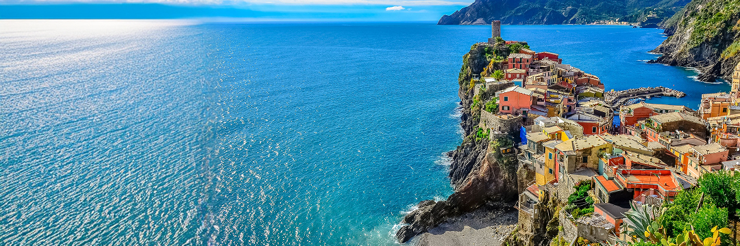 Best Beach Destinations in Italy (Luxury Guide 2026) 9 monterosso beach cinque terre colorful houses arangrant