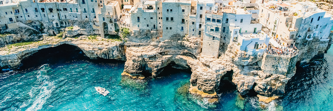 Best Beach Destinations in Italy (Luxury Guide 2026) 5 polignano a mare beach puglia cliffs arangrant