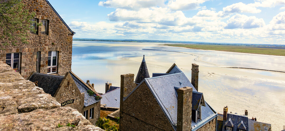 Mont Saint-Michel: spend a night on a tidal island that disappears twice a day 3 mont saint michel france rooftops museum view