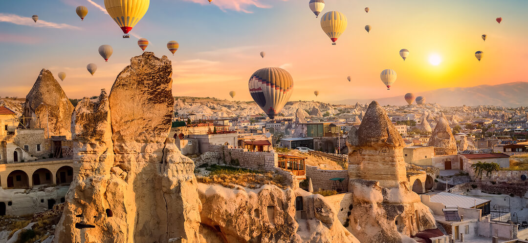 Sleeping in a cave in Cappadocia: how the room you book changes the experience 4 goreme hot air balloons over cappadocia at sunrise