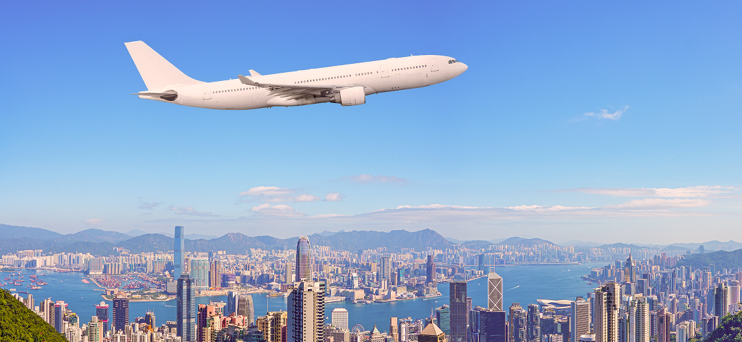 Where premium US travelers flew in the first half of 2026 3 long haul aircraft flying over hong kong skyline