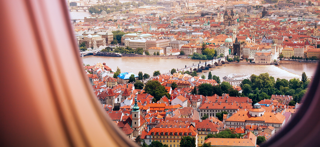 Where premium US travelers flew in the first half of 2026 2 prague city view from airplane window premium travel destination