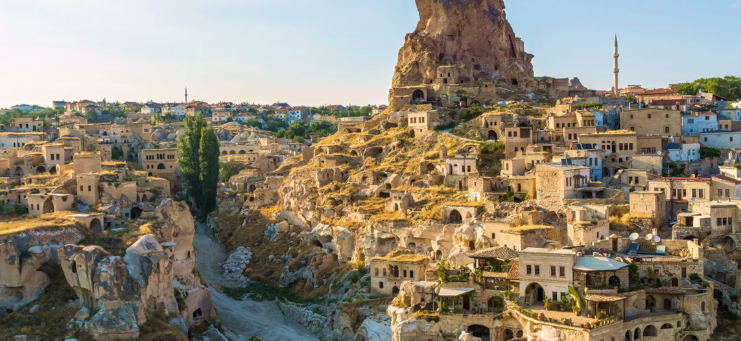 Sleeping in a cave in Cappadocia: how the room you book changes the experience 3 uchisar cave houses and rock castle in cappadocia