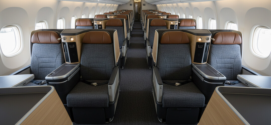 Does American Airlines still have first class? 3 american airlines first class cabin interior
