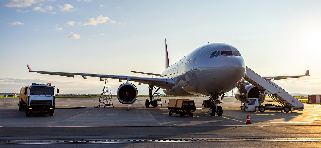 Does American Airlines still have first class? 6 passenger airplane parked at airport